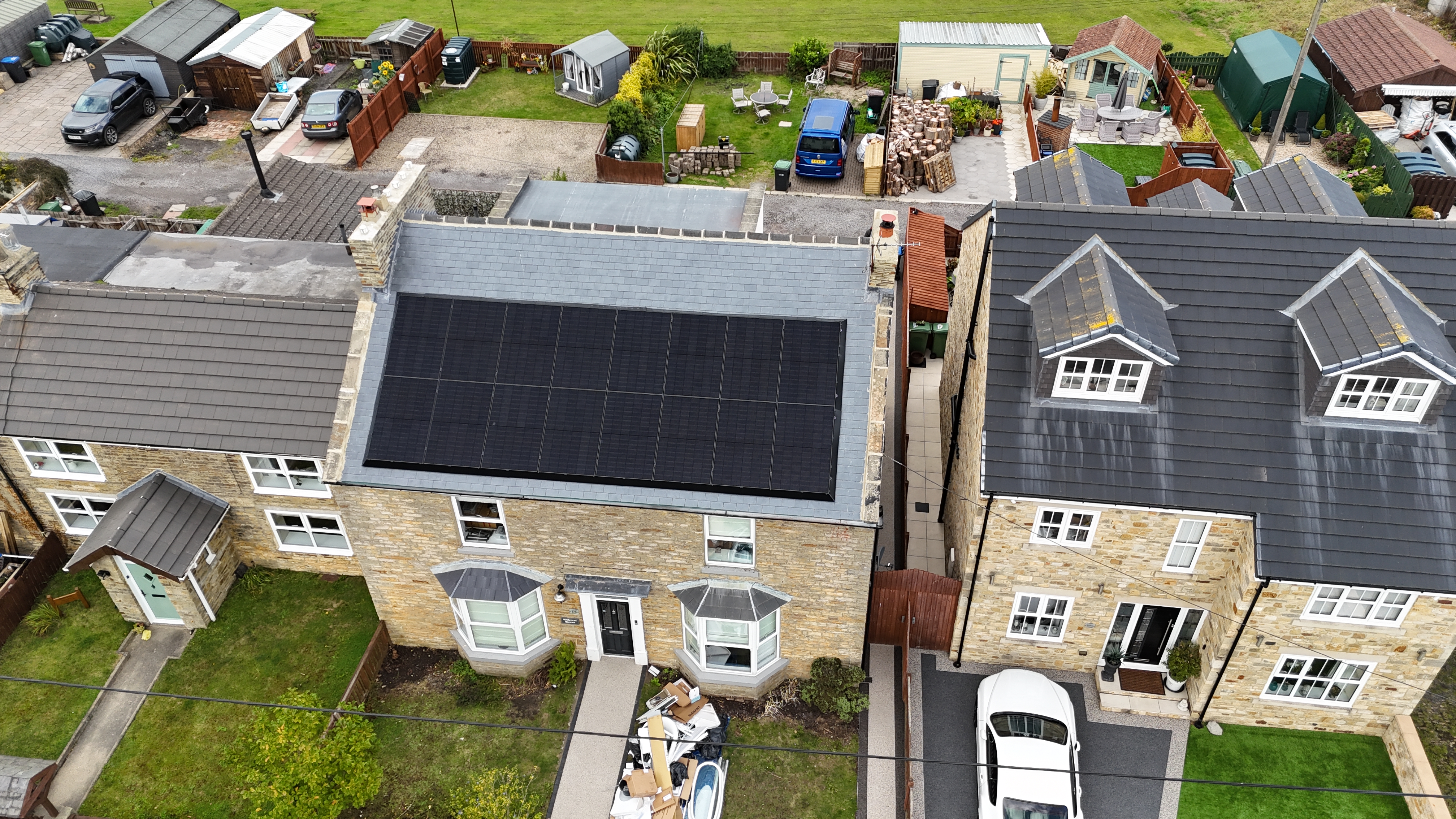 Aerial drone view of solar panels on a Yorkshire terrace