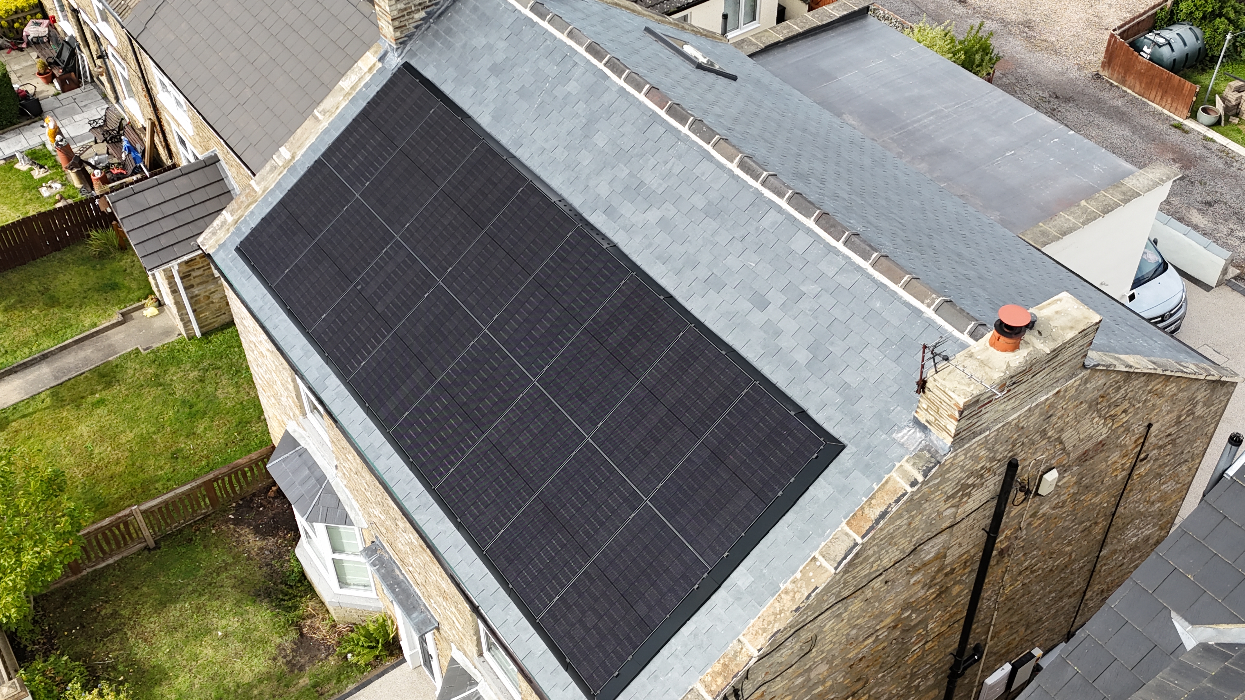 Aerial view of 18-panel solar installation on Yorkshire stone house